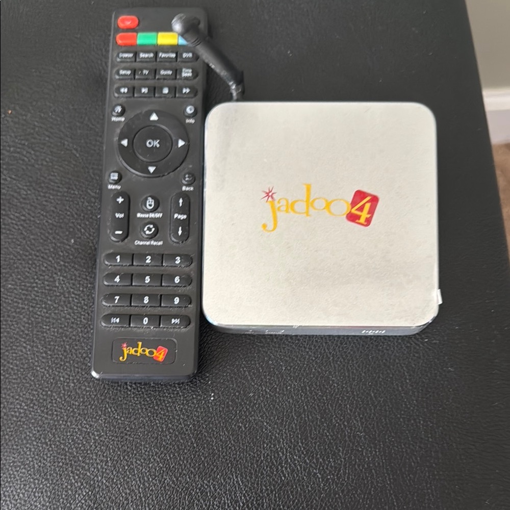 Silver Media Streamer with Black Remote